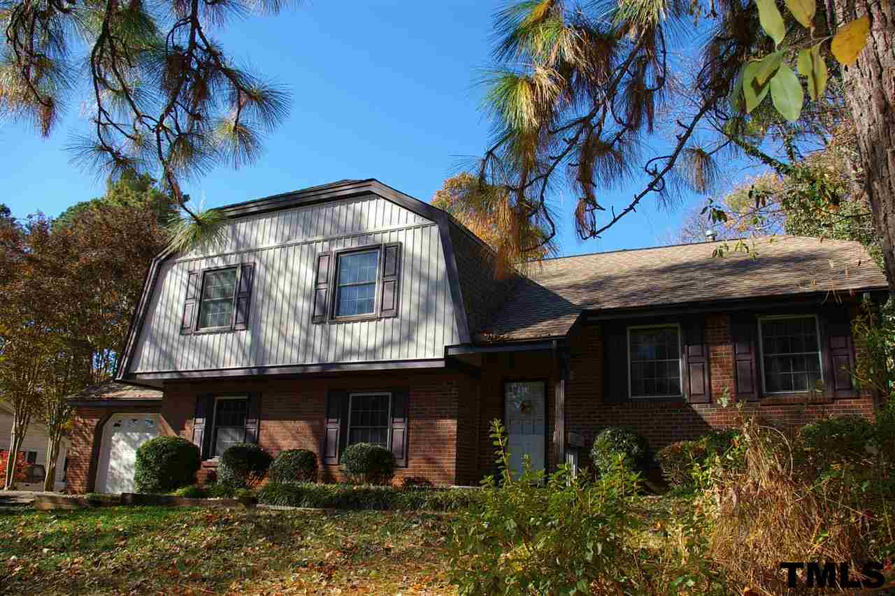 2609 Wycliff Road Raleigh, NC 27607 - Photo 1 of 14 a front view of a house with garden