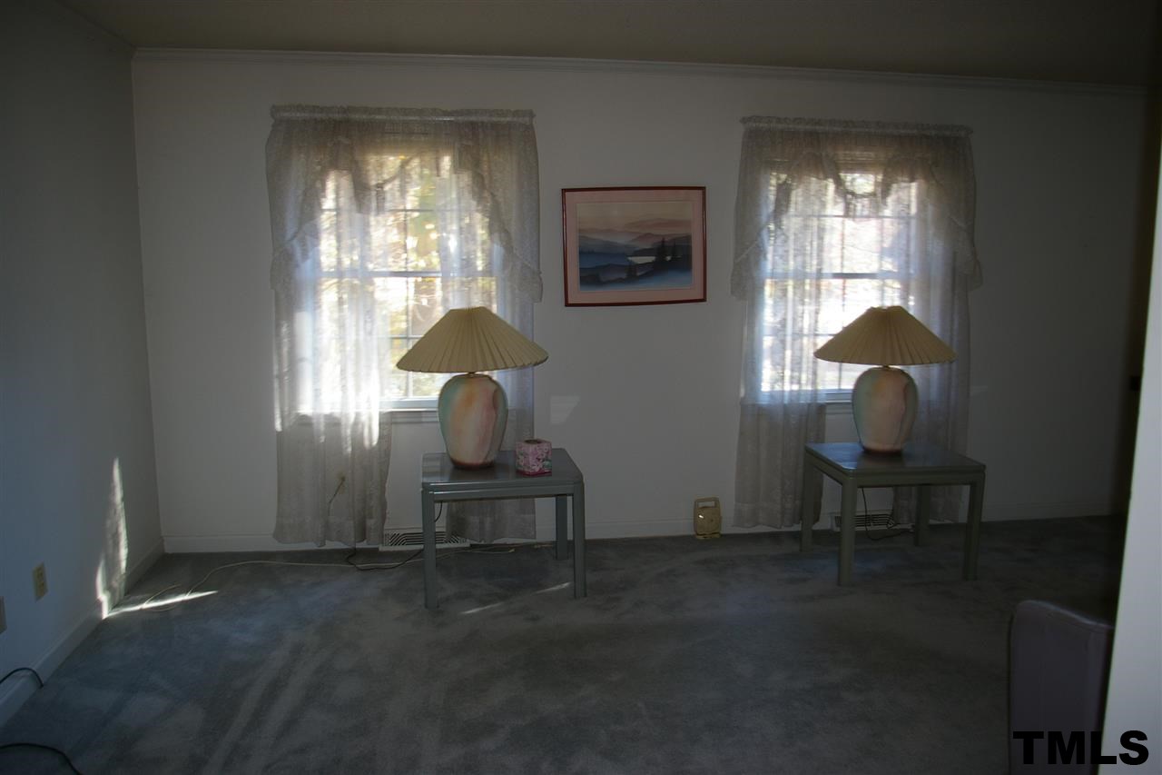 2609 Wycliff Road Raleigh, NC 27607 - Photo 5 of 14 a living room with furniture and a window