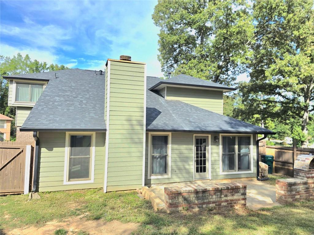 6992 Ivy Pointe Row Austell, GA 30168 - Photo 3 of 32 front view of a house with a yard