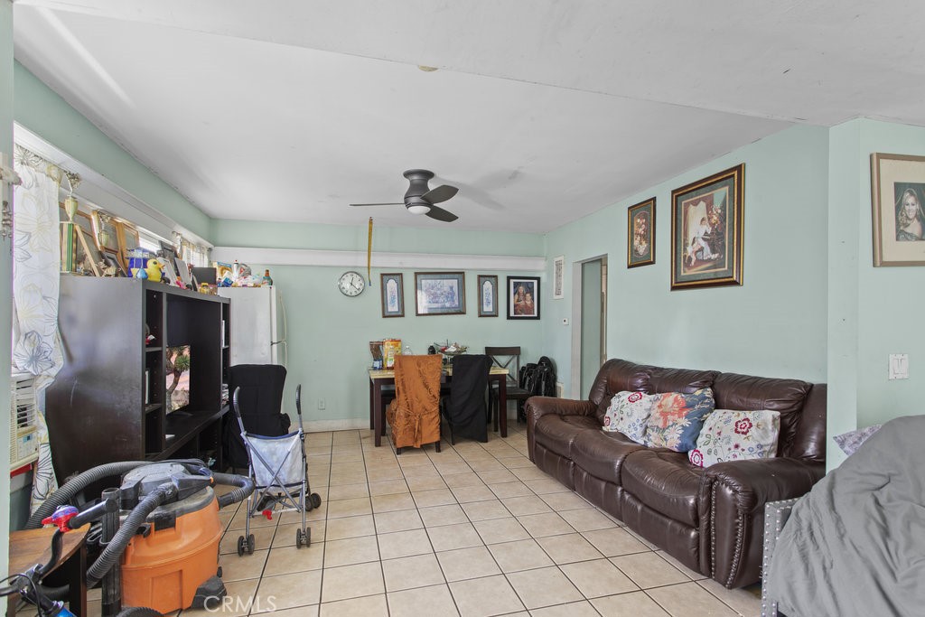 224 West 14th Street Long Beach, CA 90813 - Photo 20 of 31 a living room with furniture and a flat screen tv