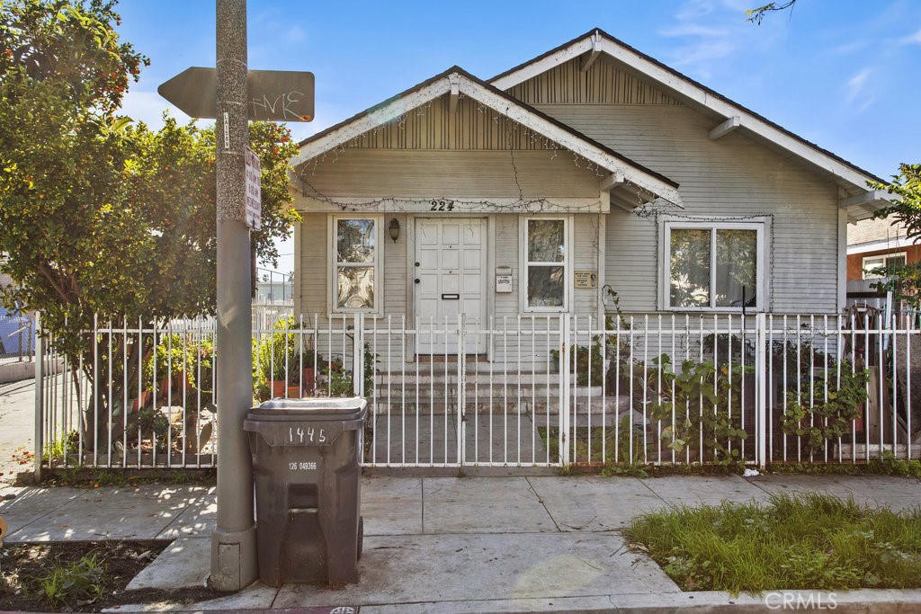 224 West 14th Street Long Beach, CA 90813 - Photo 2 of 31 a front view of a house with a yard