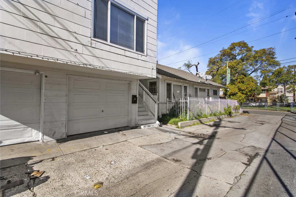 224 West 14th Street Long Beach, CA 90813 - Photo 26 of 31 a view of a house with a patio