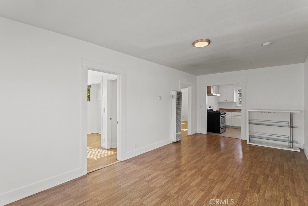 224 West 14th Street Long Beach, CA 90813 - Photo 10 of 31 a view of a kitchen with wooden floor