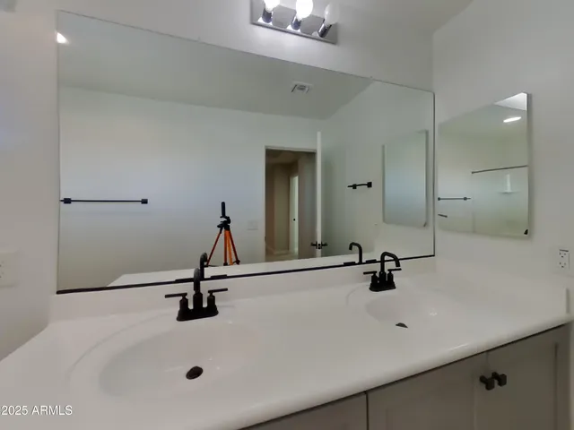 a white toilet sitting next to a bath tub shower