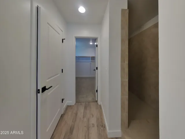 a bathroom with a sink double vanity and a mirror