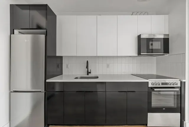 a view of a balcony with an ocean view