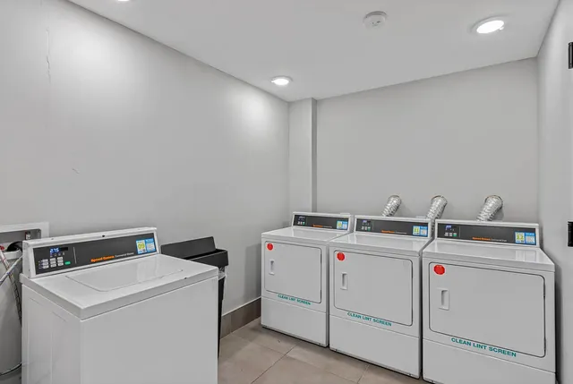 a view of parking garage with cars