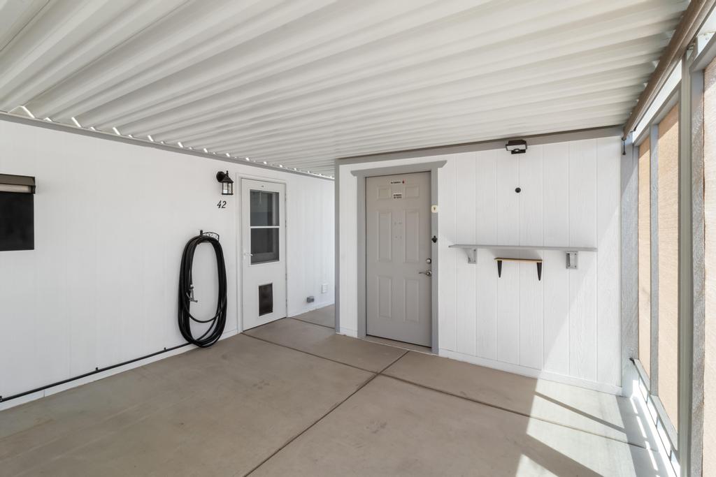 1545 East El Rodeo Road, Unit 42 Fort Mohave, AZ 86426 - Photo 10 of 45 a view of a hallway with painted walls