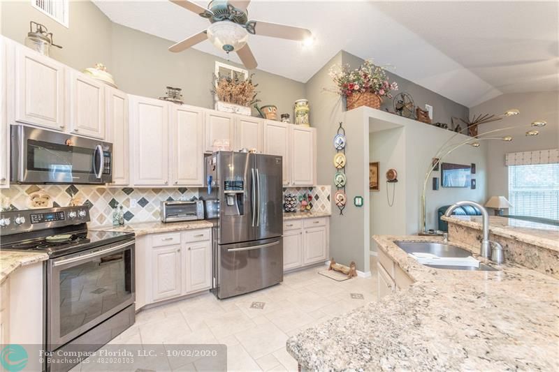 Large Renovated kitchen with lots of counter space and center island. Perfect for entertaining