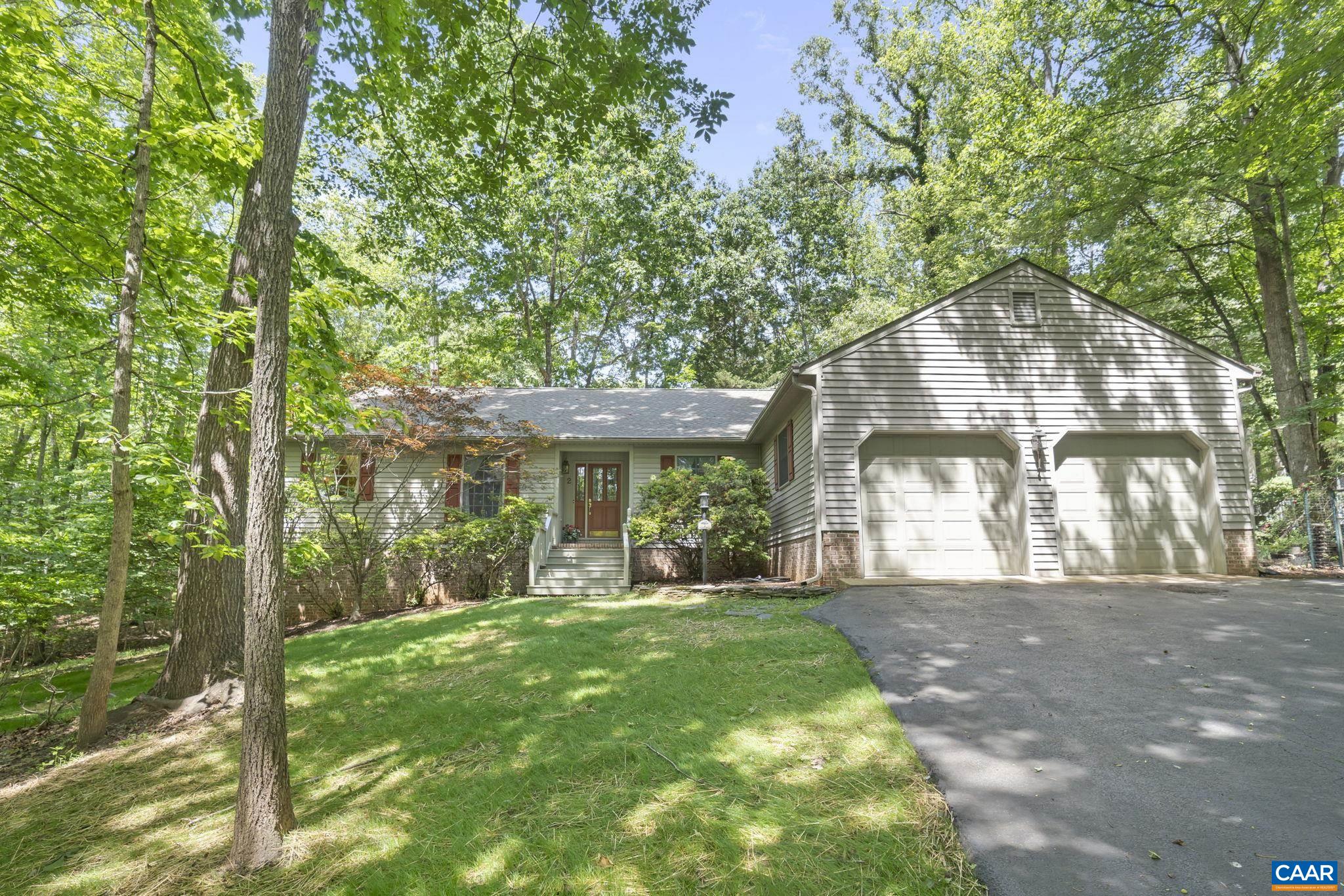 2 Whippoorwill Lane Palmyra, VA 22963 - Photo 1 of 36 a view of a big house with a big yard and large tree