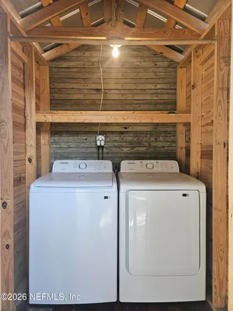 a utility room with dryer and washer