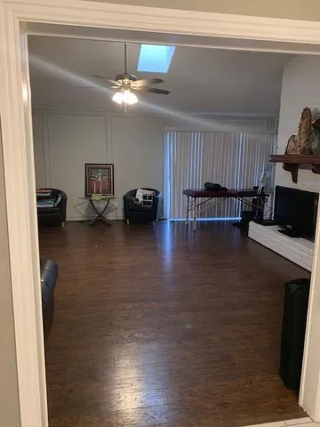 a view of livingroom with furniture and wooden floor