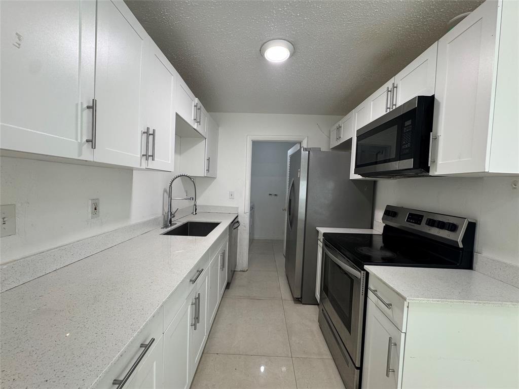 970 Southwest 76th Avenue, Unit 3 North Lauderdale, FL 33068 - Photo 2 of 11