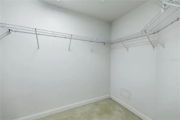 a view of a room with racks on the wall