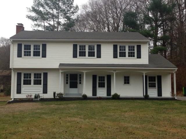 286 Morehouse Road Easton, CT 06612 - Photo 1 of 1 a front view of a house with a garden