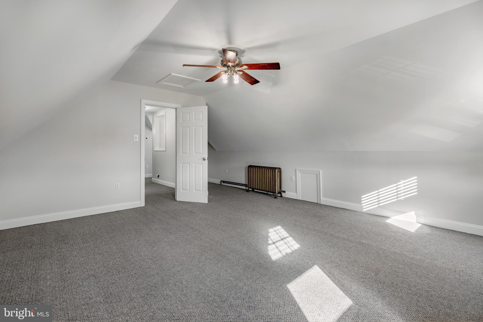 1210 West Darby Road Havertown, PA 19083 - Photo 25 of 33 a view of a livingroom with a ceiling fan and window
