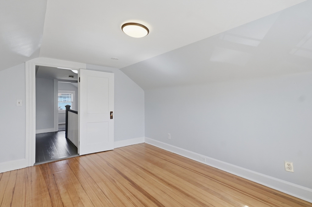 55 Addison Avenue Lynn, MA 01902 - Photo 13 of 23 a view of empty room with wooden floor