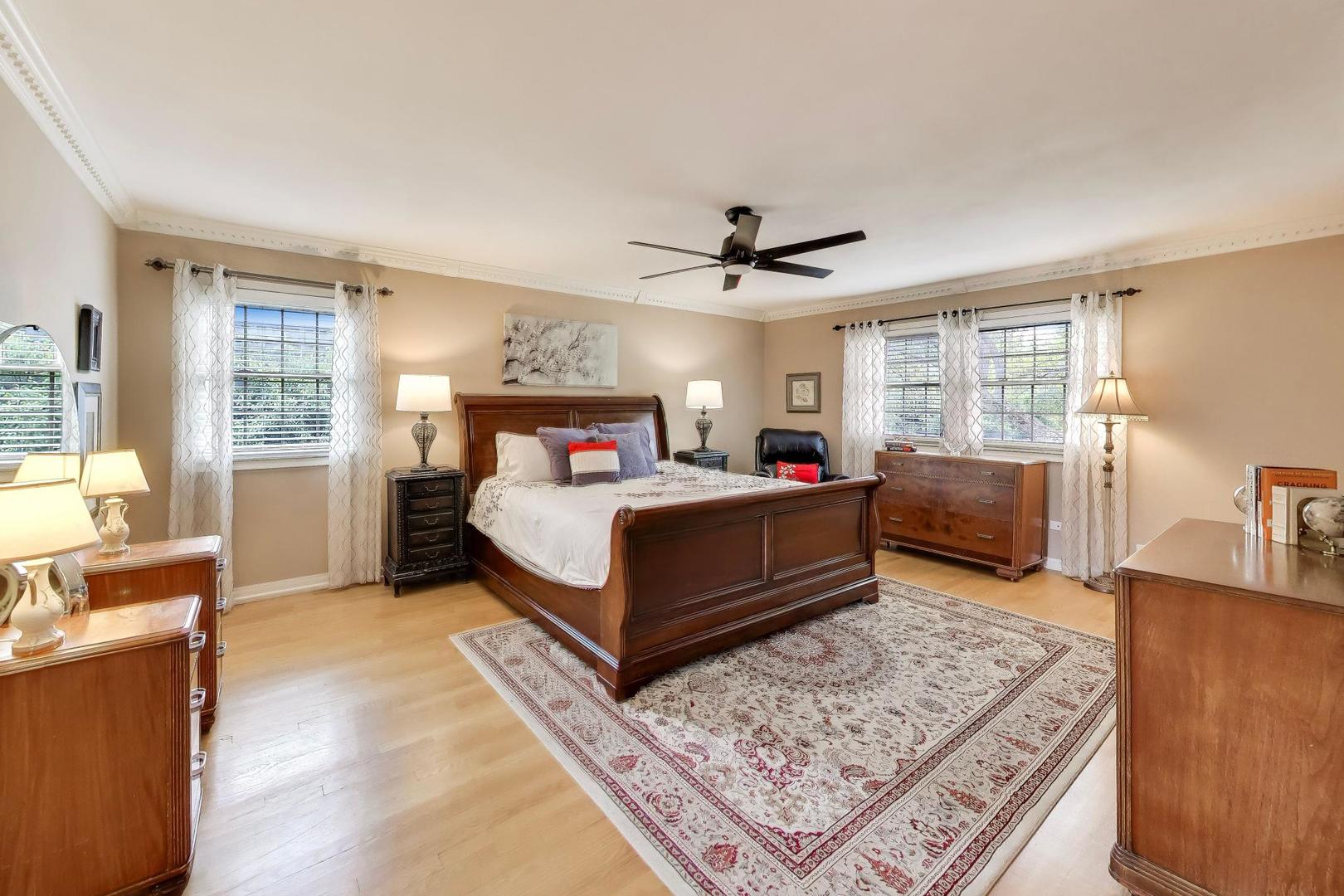 3956 Rutgers Lane Northbrook, IL 60062 - Photo 18 of 41 a bed room with a bed and a couch