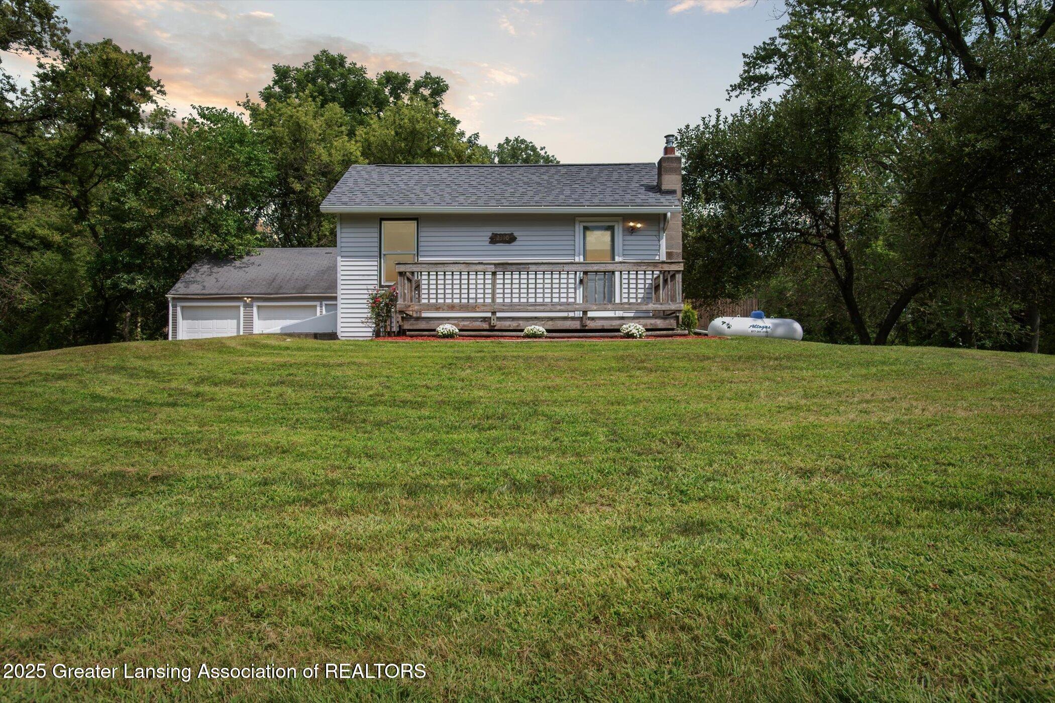 2310 Gilbert Road Lansing, MI 48911 - Photo 1 of 32 Front