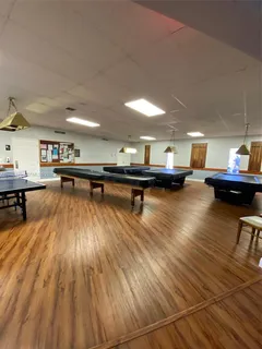 a kitchen view with wooden floor and a counter top space