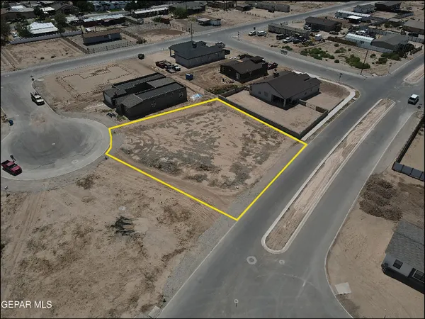 a view of a backyard of a house