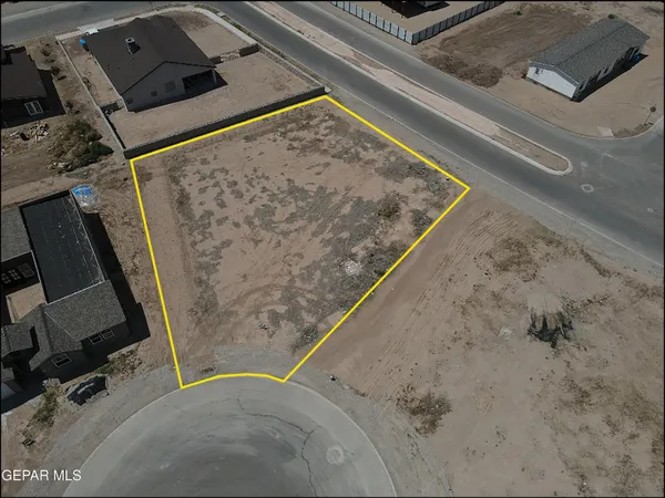 a view of a water heater and a stove