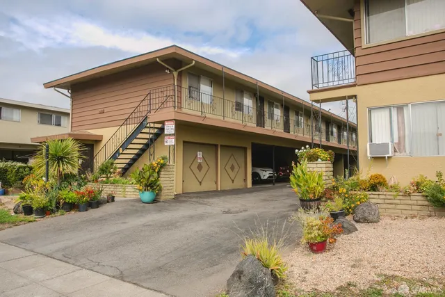 a view of a house with sitting area