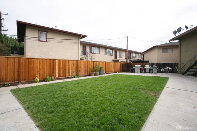 a view of a back yard of the house