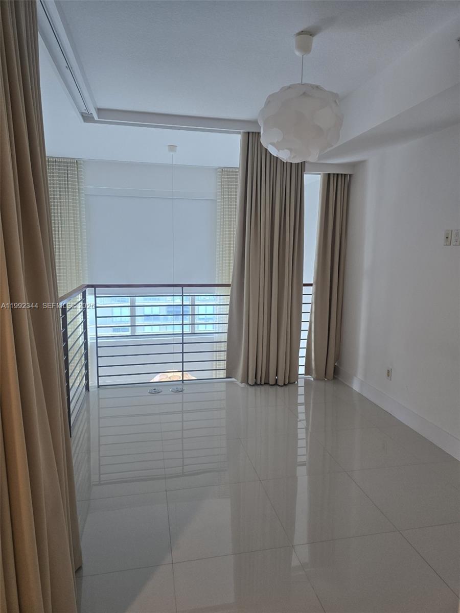 60 Southwest 13th Street, Unit 2604 Miami, FL 33130 - Photo 2 of 20 2nd floor bedroom, loft.