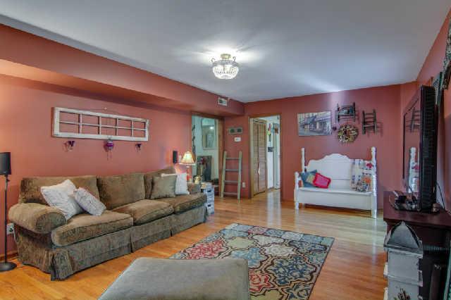 708 Still Pond Road Columbia, TN 38401 - Photo 8 of 20 a living room with furniture and a rug