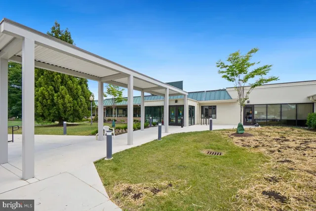 a view of a house with a swimming pool