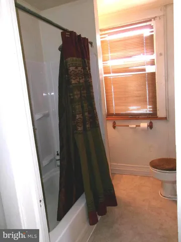 a view of staircase with wooden floor and stairs