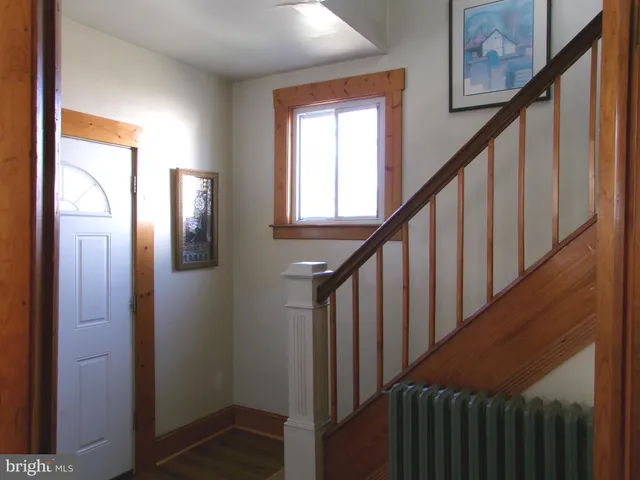 a kitchen with a sink stove and refrigerator