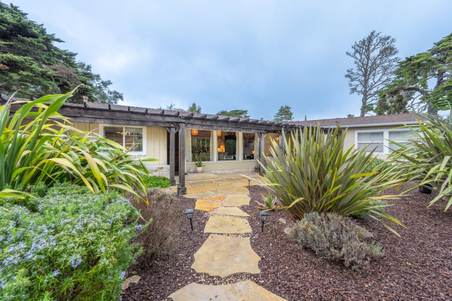 a view of a house with a garden
