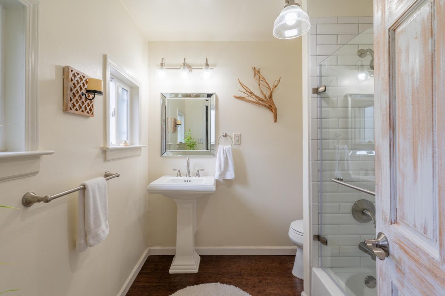 26208 Atherton Drive Carmel, CA 93923 - Photo 13 of 22 a bathroom with a sink a toilet and shower