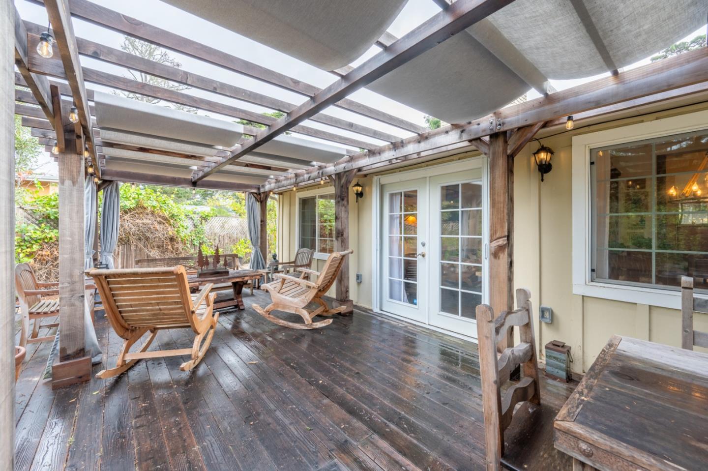 26208 Atherton Drive Carmel, CA 93923 - Photo 15 of 22 a living room with furniture and wooden floor