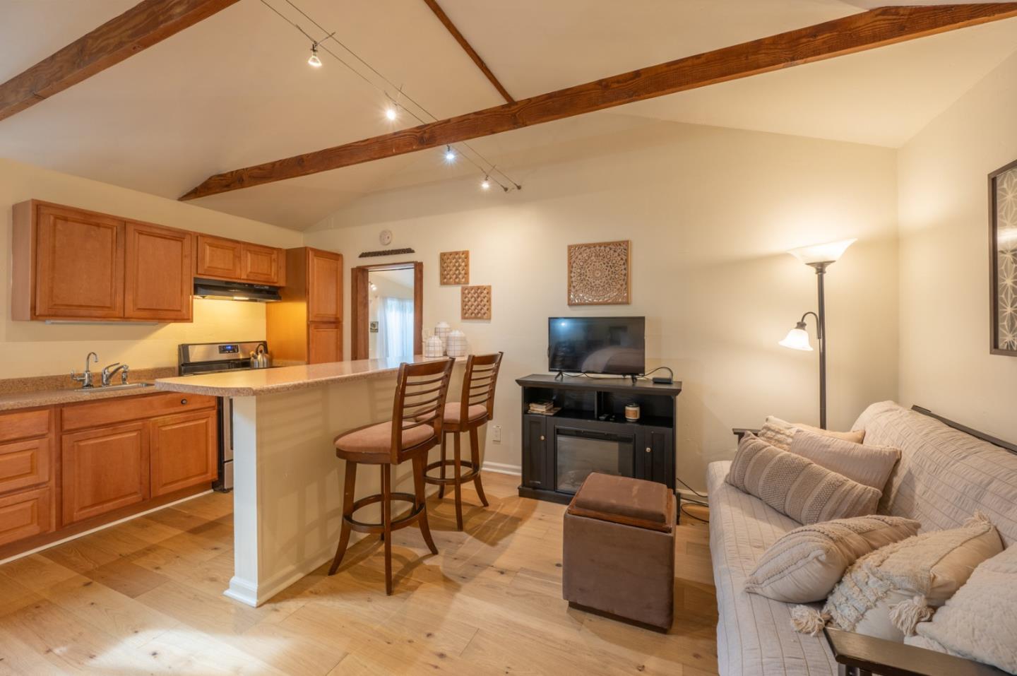 26208 Atherton Drive Carmel, CA 93923 - Photo 19 of 22 a living room with furniture and a flat screen tv