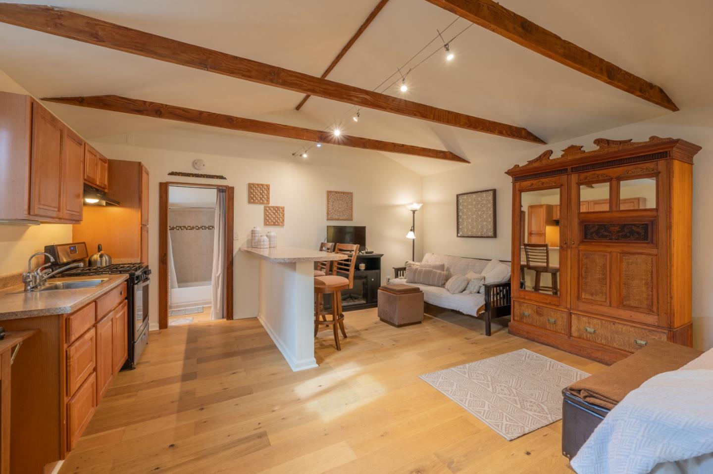 26208 Atherton Drive Carmel, CA 93923 - Photo 20 of 22 a living room with furniture stove and a refrigerator