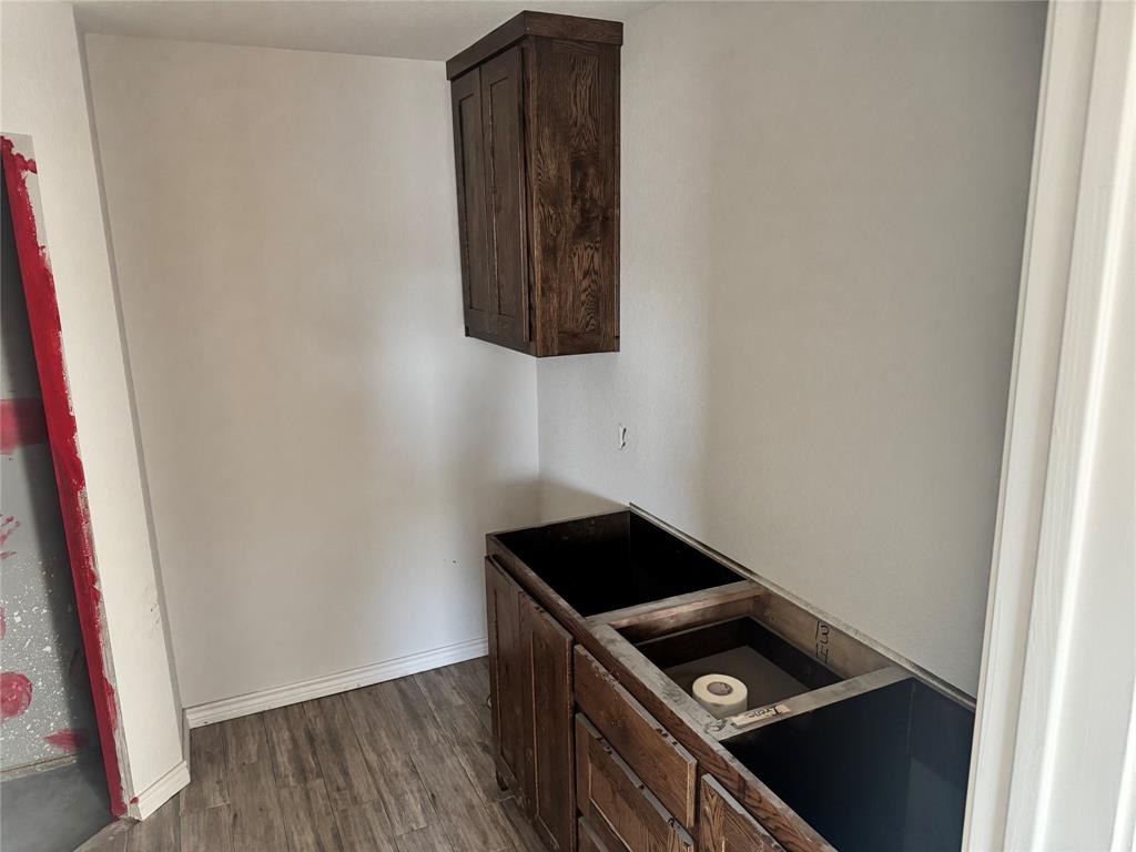 1008 Morgan Court Springtown, TX 76082 - Photo 6 of 6 a view of kitchen with wooden floor