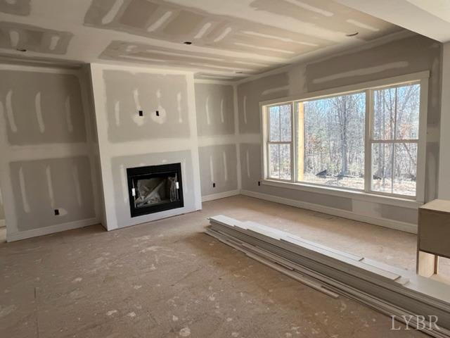 21 Elk Creek Road Forest, VA 24551 - Photo 4 of 18 a view of an empty room with a fireplace and a window