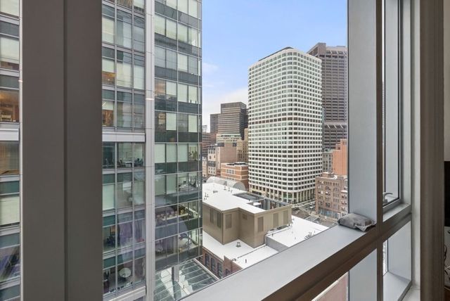 a close view of dining table and chairs