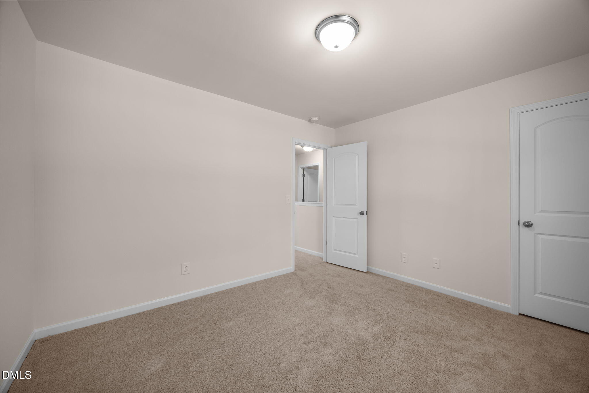107 Deanne Lane Coats, NC 27521 - Photo 25 of 35 an empty room with an entryway