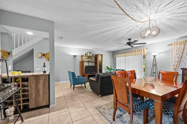 a view of a dining room with furniture