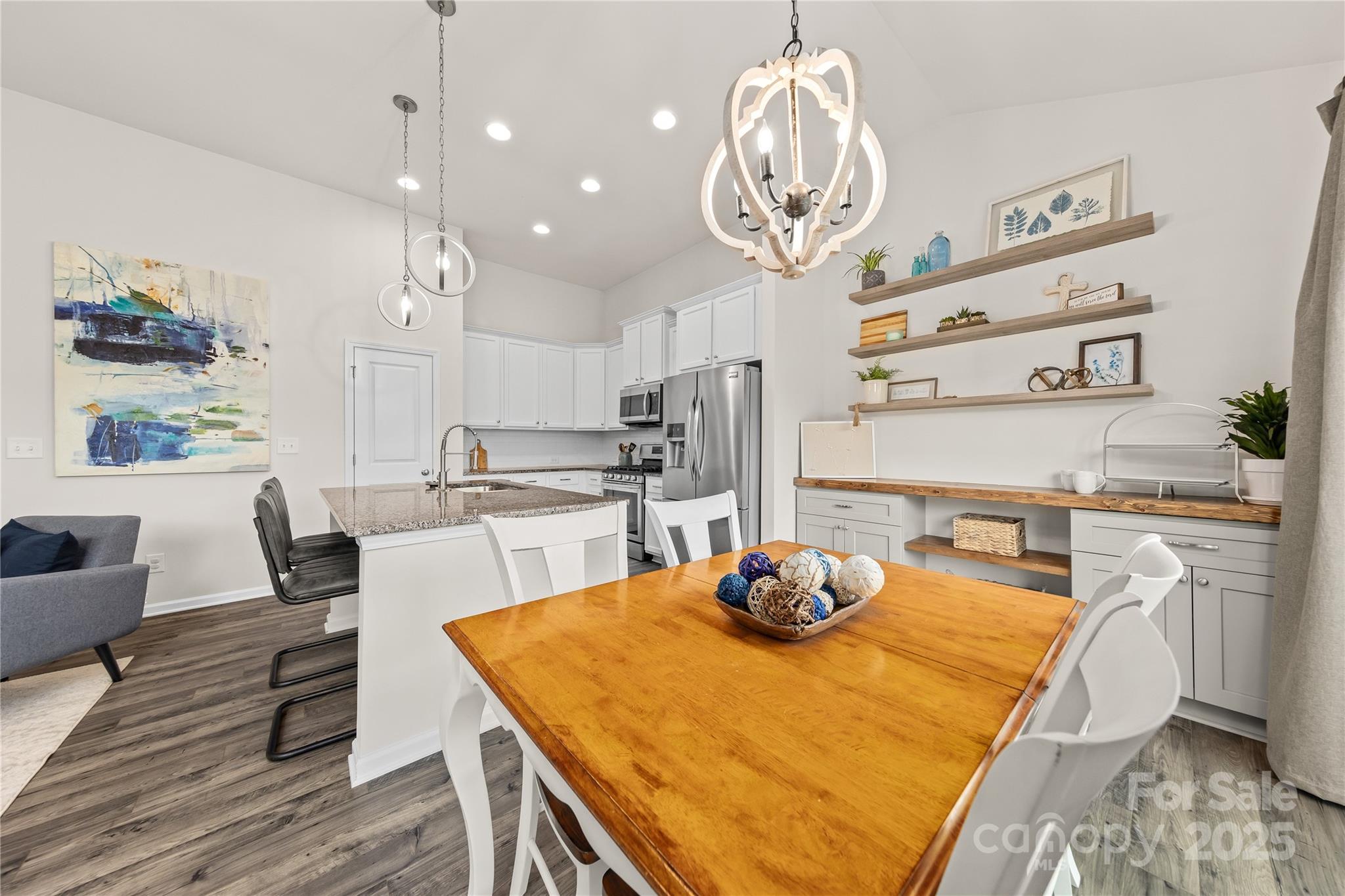 4515 Dover Court Denver, NC 28037 - Photo 14 of 41 a kitchen with a dining table and chairs