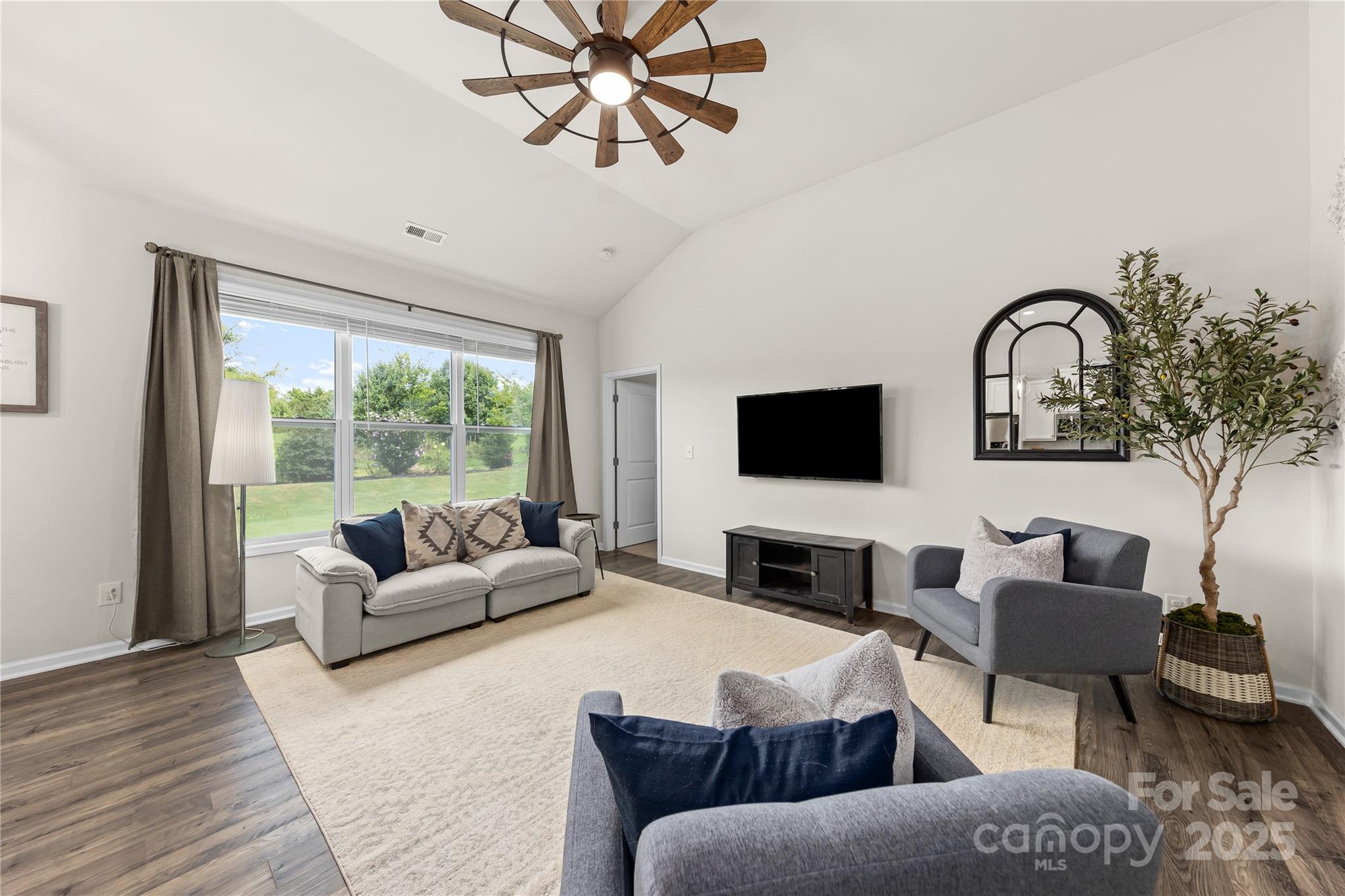 4515 Dover Court Denver, NC 28037 - Photo 17 of 41 a living room with furniture and a flat screen tv