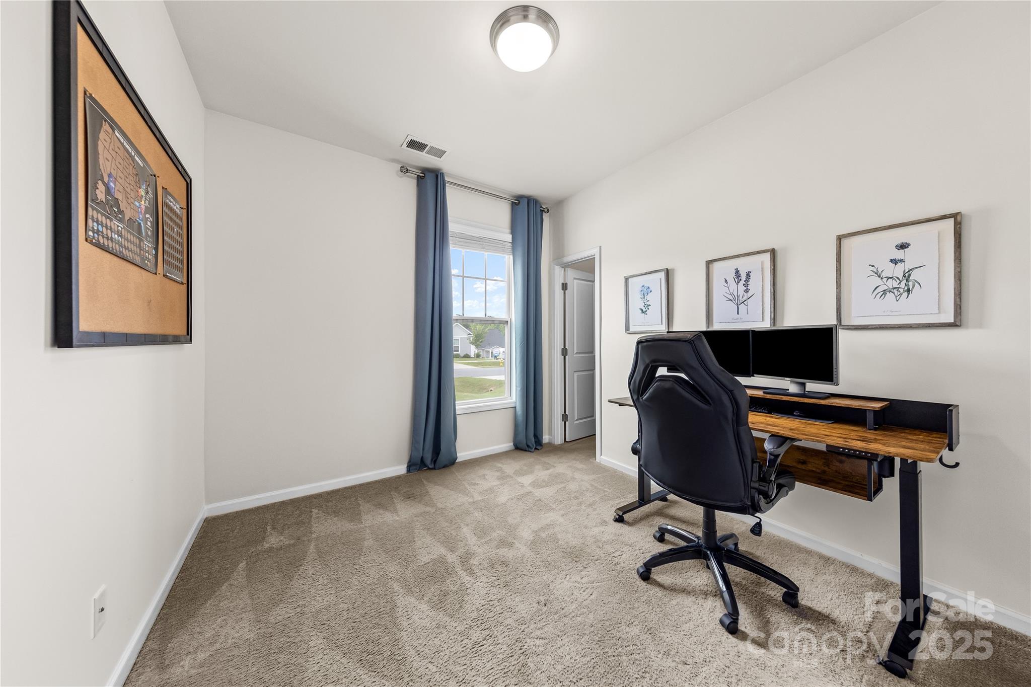 4515 Dover Court Denver, NC 28037 - Photo 28 of 41 a view of a workspace with furniture and a window