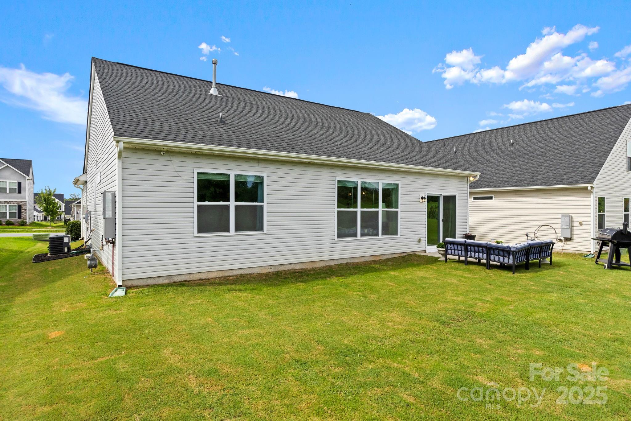 4515 Dover Court Denver, NC 28037 - Photo 39 of 41 a house view with swimming pool and sitting space