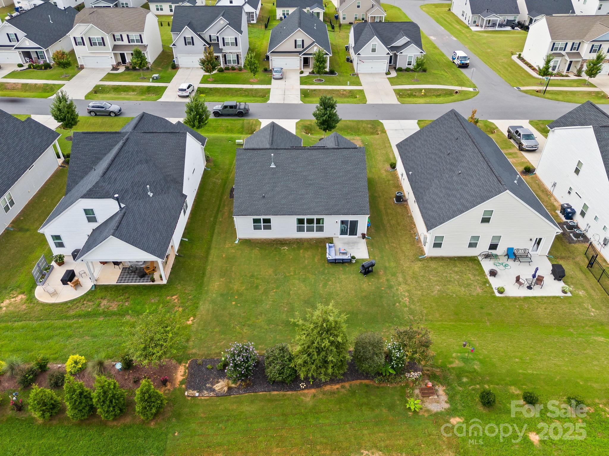 4515 Dover Court Denver, NC 28037 - Photo 40 of 41 an aerial view of residential houses with outdoor space and swimming pool