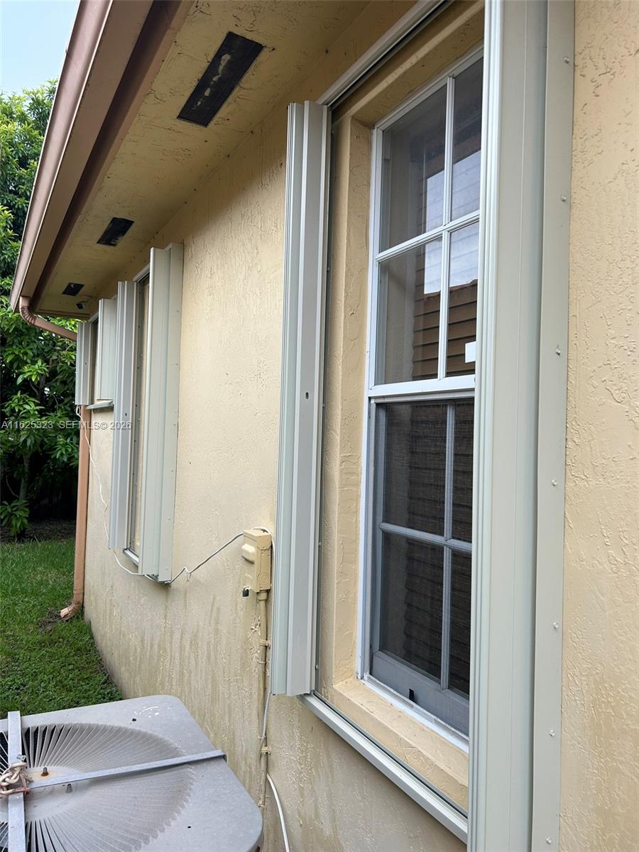 12414 Southwest 213th Street Miami, FL 33177 - Photo 15 of 15 a view of a door