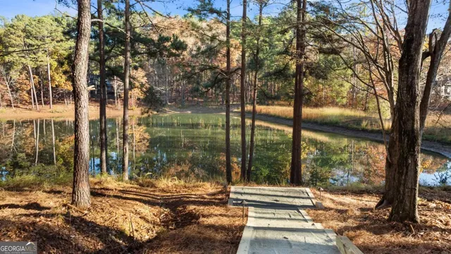 a kitchen with a sink stainless steel appliances and cabinets